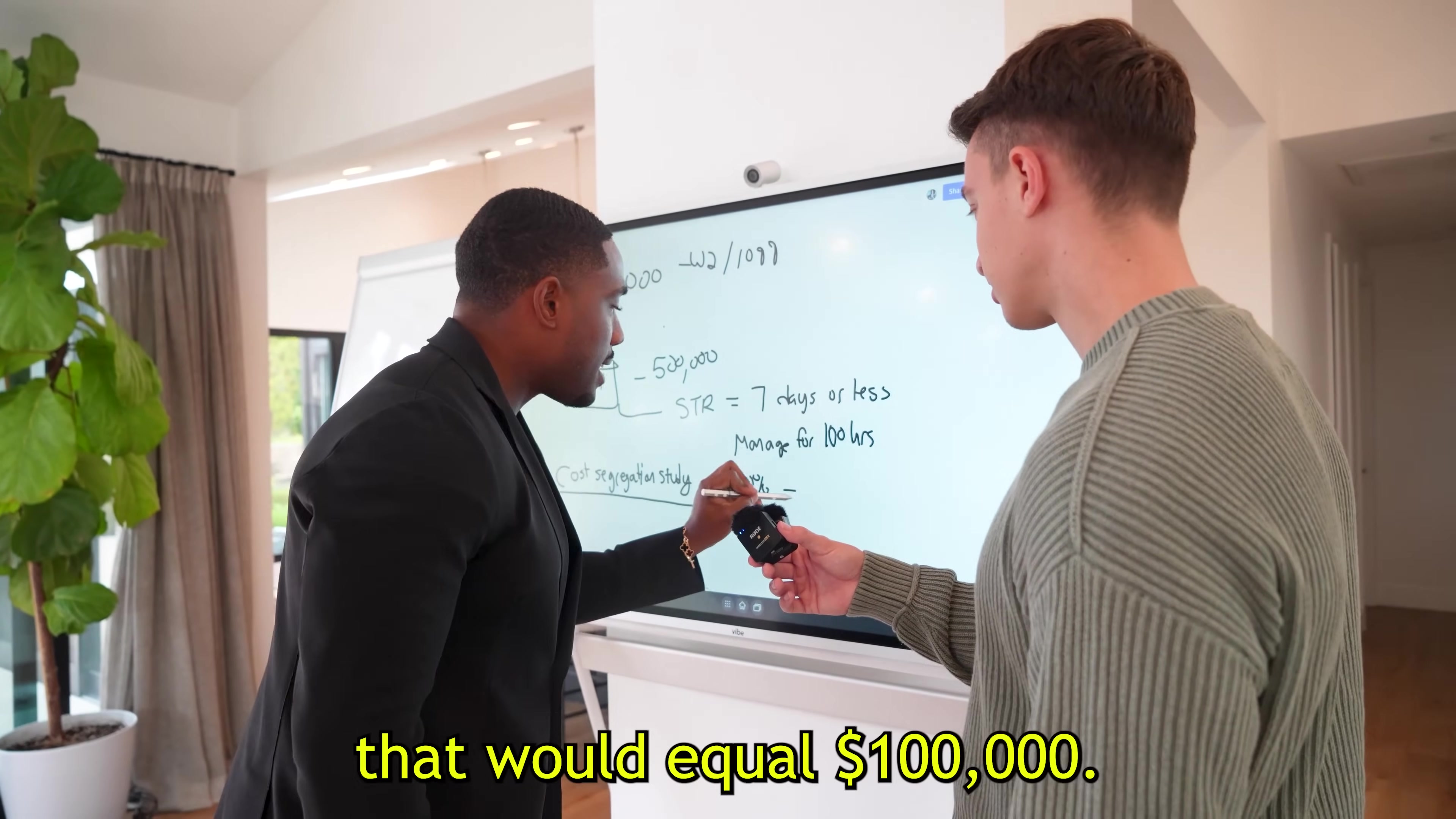 Carlton Dennis works through the short-term-rental example. The visible arithmetic explains the claim; it does not establish eligibility. Frame from School of Hard Knocks at 00:15:32.